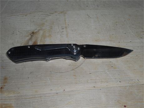 A SKINNING OR HANDY BELT CLIP PRUNING KNIFE