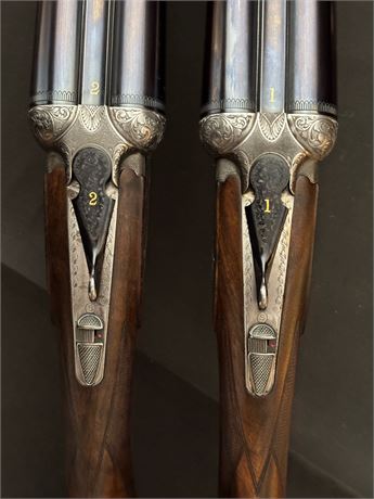 A FINE PAIR OF BERETTA 627 EELL 12 BORE SIDE BY SIDE SHOTGUNS