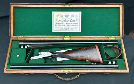 A JOSEPH LANG & SON 12 BORE SHOTGUN COMPLETE WITH TWO SETS OF BARRELS