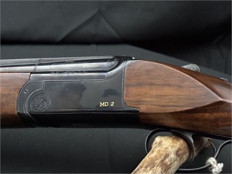 AN AYA 'MD2' 12 BORE OVER AND UNDER SHOTGUN