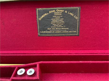 A LEATHER GUN CASE WITH CHURCHILL, ATKIN, GRANT & LANG LTD TRADE LABEL