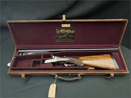 A WILLIAM FORD 12 BORE SHOTGUN WITH CASE