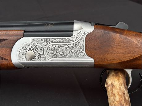 A KOFS 'SXE' 28 BORE OVER AND UNDER SHOTGUN