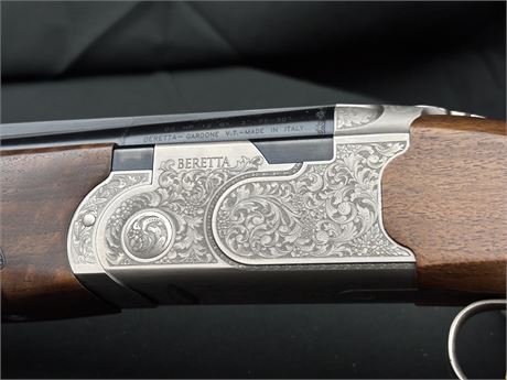 A FINE VIRTUALLY UNUSED BERETTA SPV SP 12 BORE OVER AND UNDER SHOTGUN