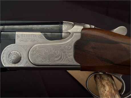 A BERETTA 690 'FIELD' 12 BORE OVER AND UNDER SHOTGUN