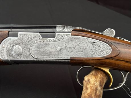 A FINE BERETTA EELL DIAMOND 20 BORE OVER AND UNDER SHOTGUN
